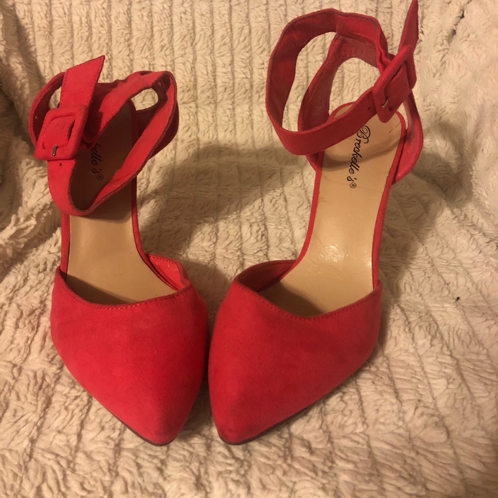 Hot pink stiletto pumps